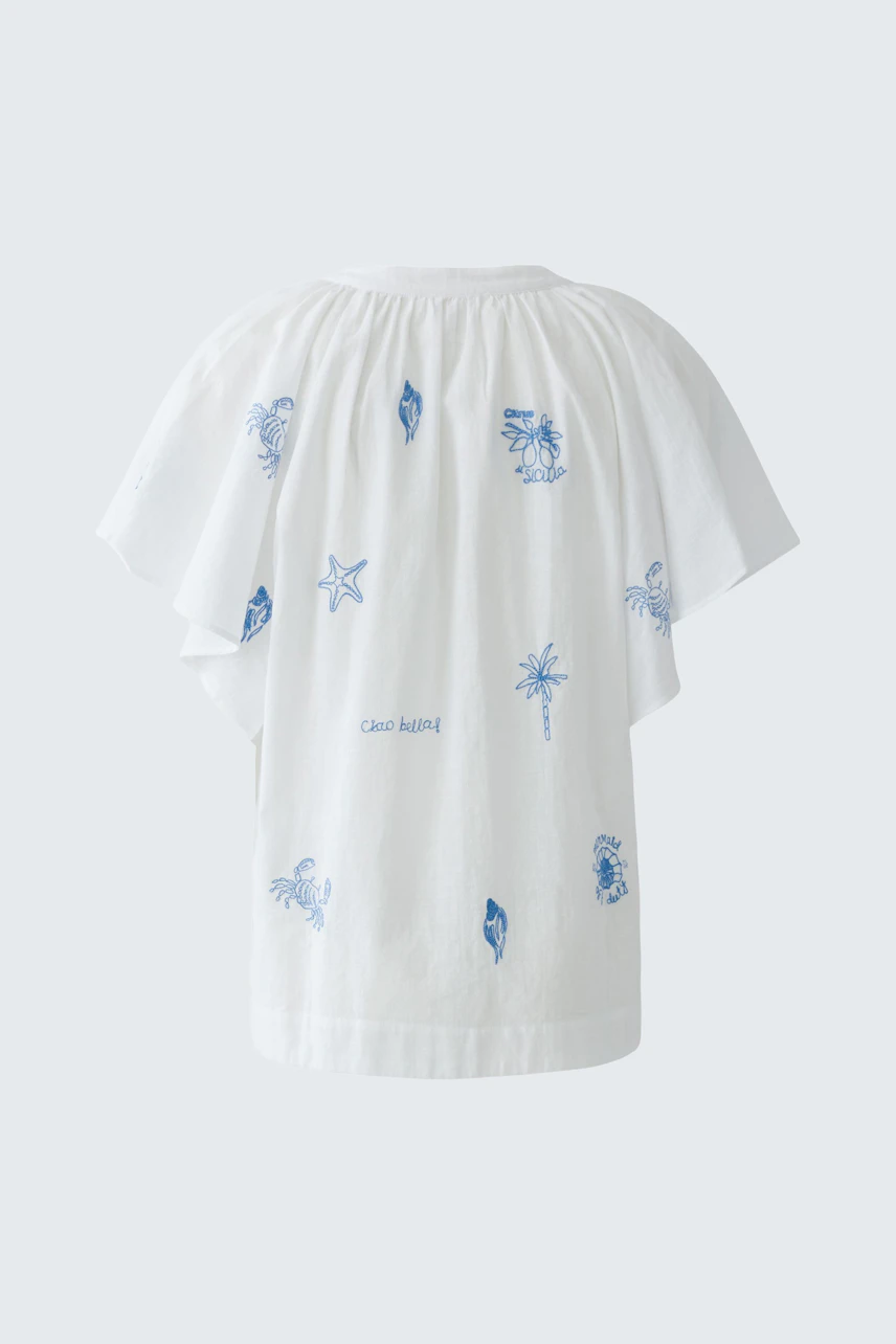 Casual women's blouse: White blouse with blue prints, short sleeves, and relaxed fit, perfect for summer.