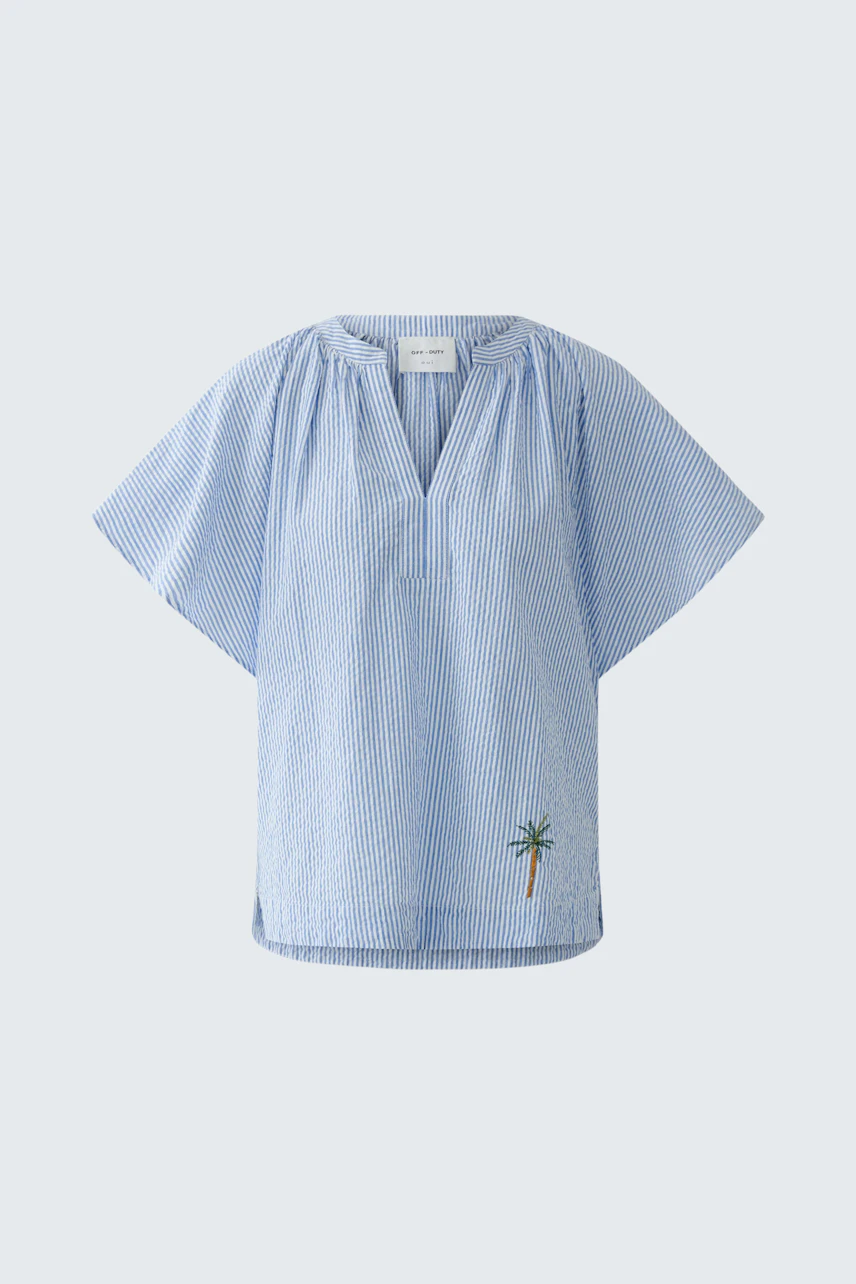 Casual women's blouse: Light blue blouse with short sleeves and palm tree embroidery.
