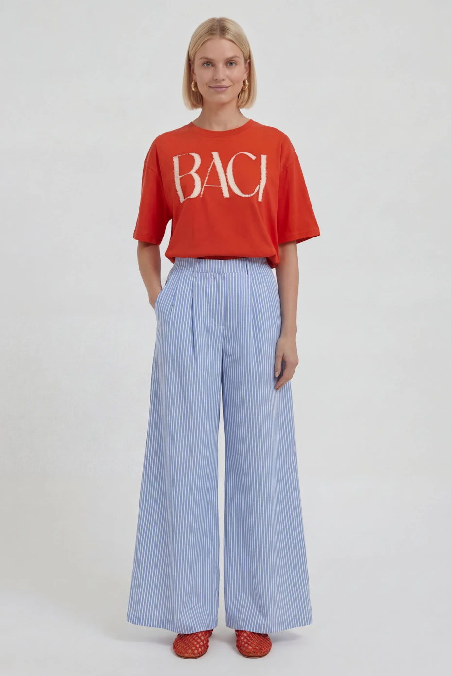 Blue striped Marlene pants: Wide-leg design, lightweight fabric, perfect for casual wear.