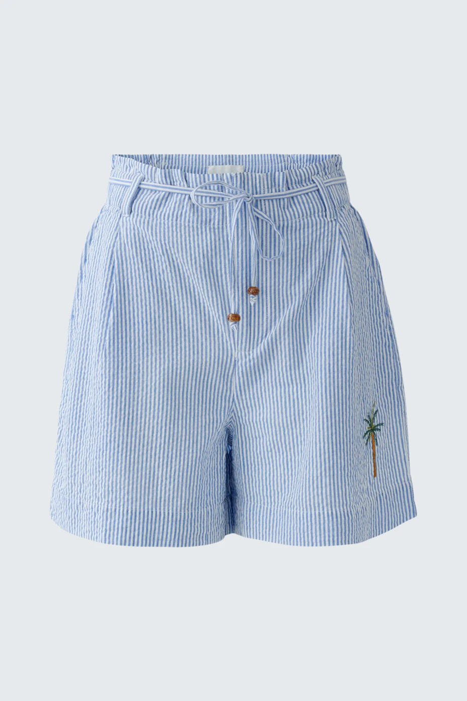 Casual women's shorts: Light blue striped shorts with palm tree embroidery, perfect for summer days.
