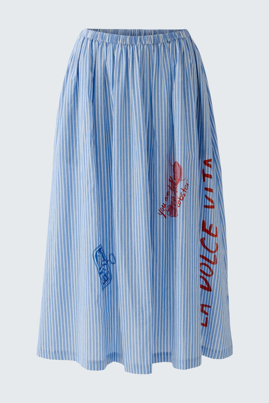 Casual A-line skirt: Blue striped skirt with red and blue prints, perfect for a relaxed look.