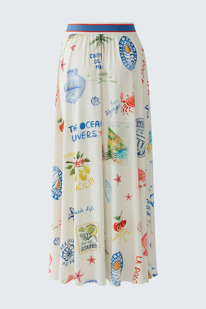 Colorful maxi skirt with playful prints, perfect for a vibrant summer look.