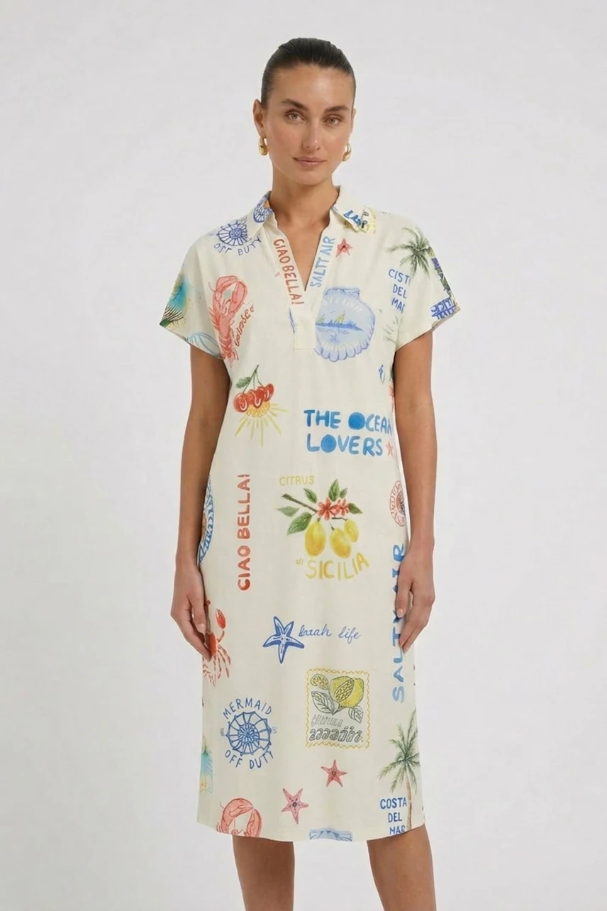 A-line dress: Woman in a colorful, printed A-line dress with short sleeves and a relaxed fit.