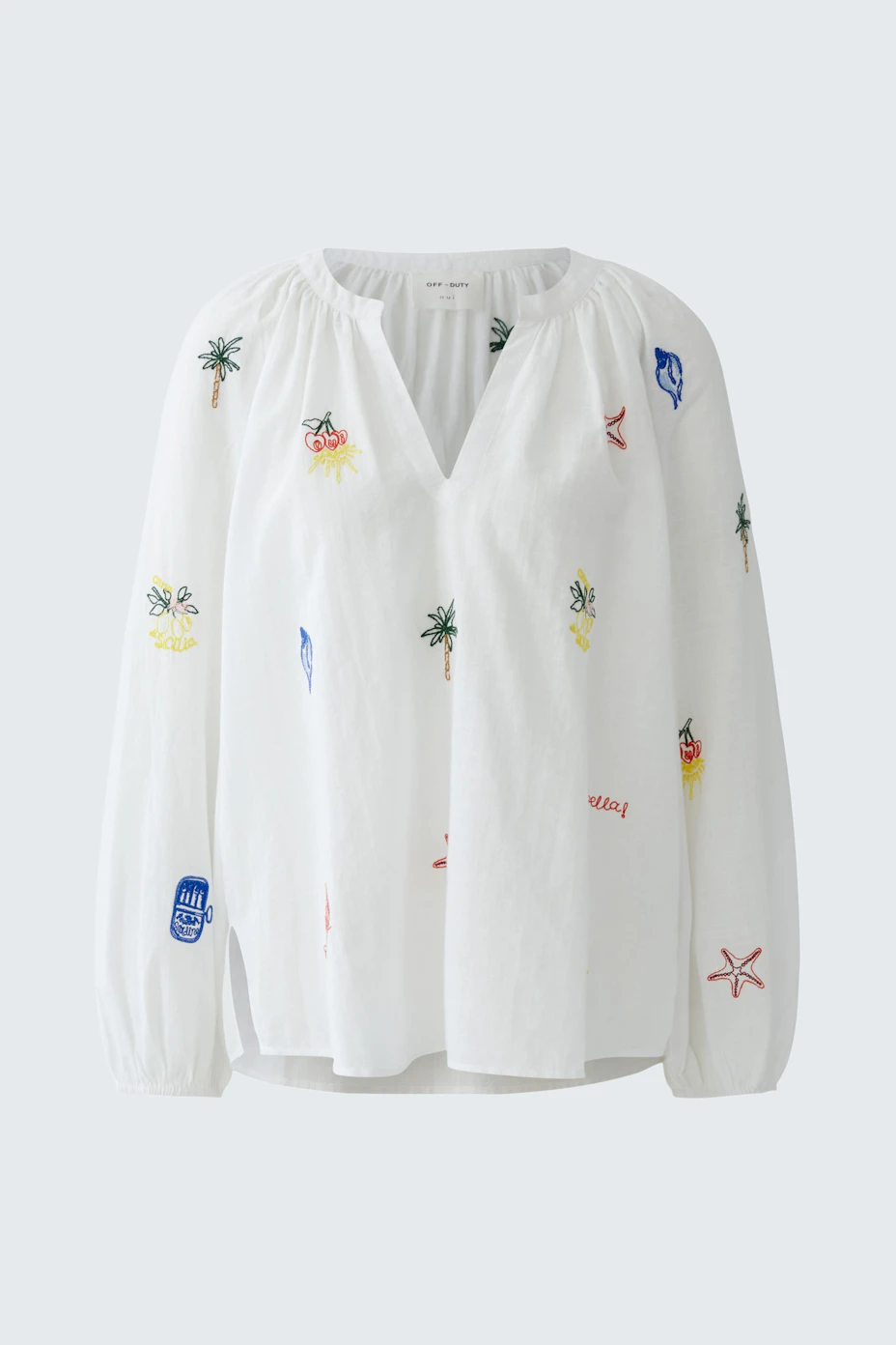 White tunic with colorful embroidery, featuring long sleeves and a relaxed fit. No model present.