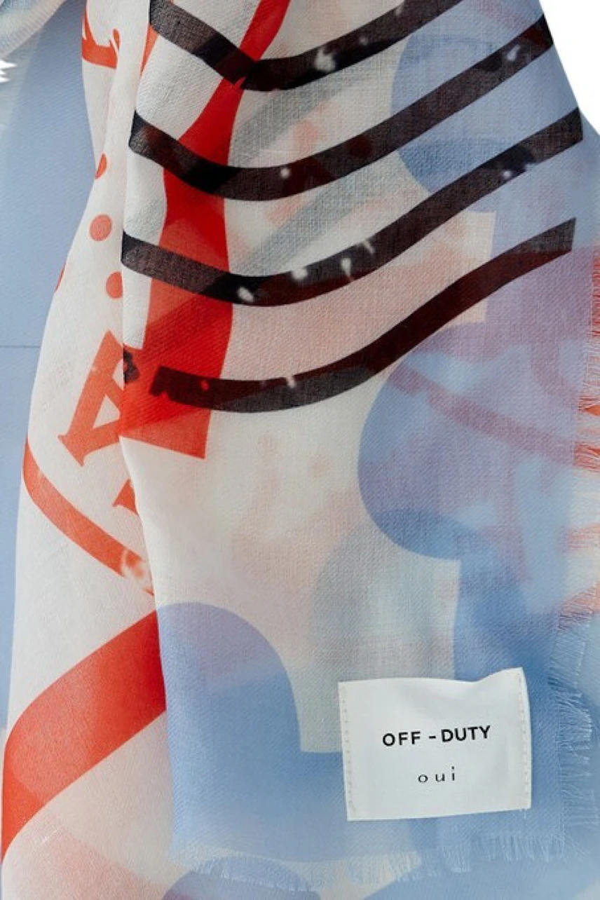 Colorful scarf with abstract patterns and 'OFF-DUTY' label, perfect for adding a vibrant touch.