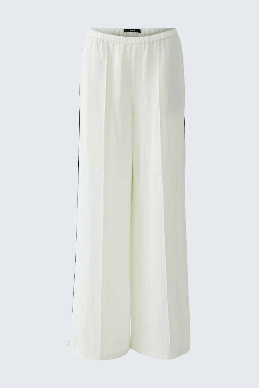 Weite Damen-Hose: Weiße, locker geschnittene Hose mit elastischem Bund, ideal für lässige Outfits.