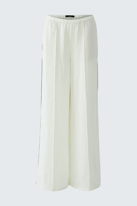 Weite Damen-Hose: Weiße, locker geschnittene Hose mit elastischem Bund, ideal für lässige Outfits.
