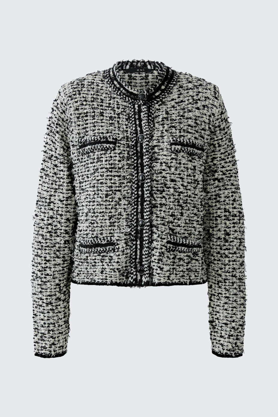 Textured knit cardigan: Black and white pattern with long sleeves, no model visible.