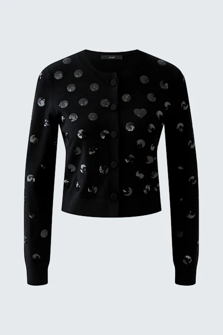 Black cardigan with polka dots, no model. Simple, stylish design for versatile wear.