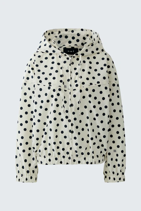 Casual women's blouson: White with black polka dots, featuring a hood and elastic cuffs.