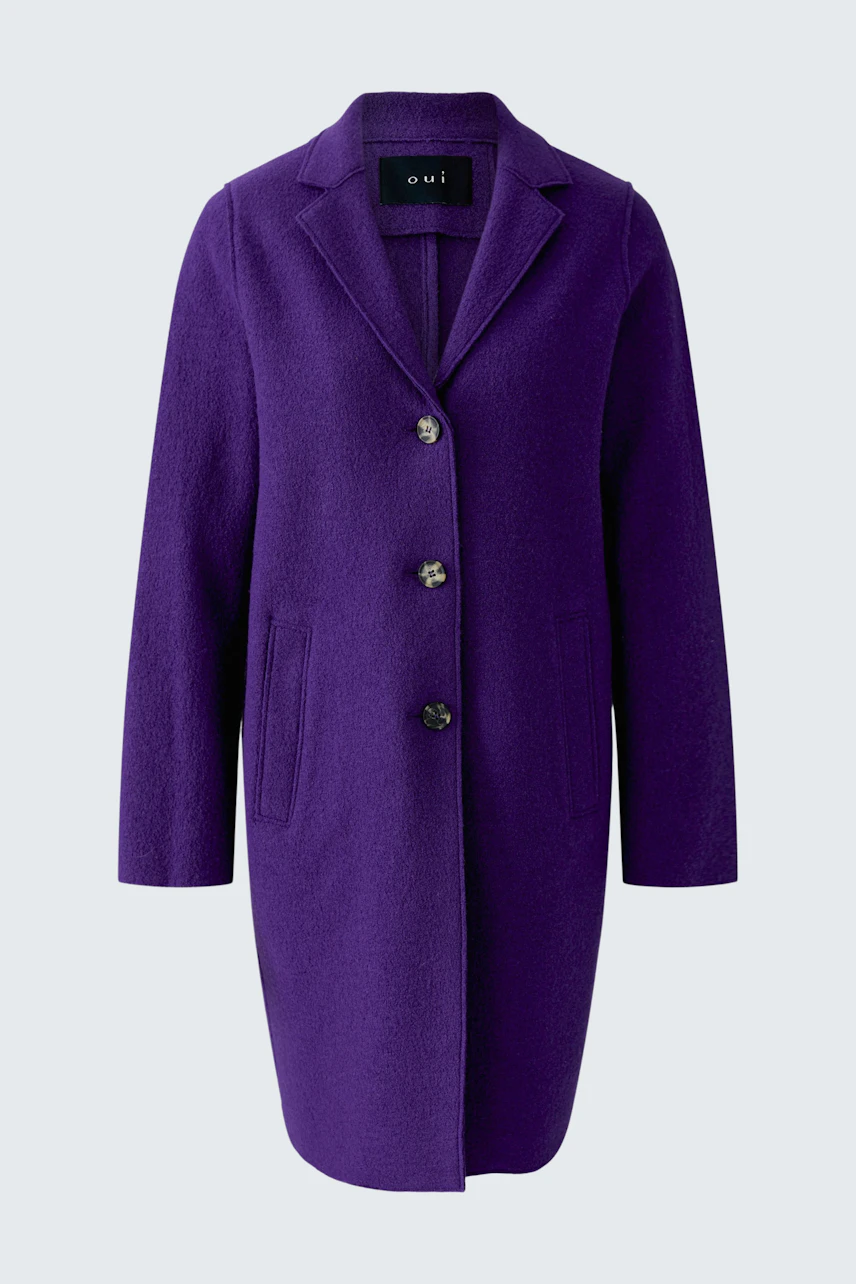 Purple wool coat: Simple, long design with buttons, perfect for layering in cooler weather.