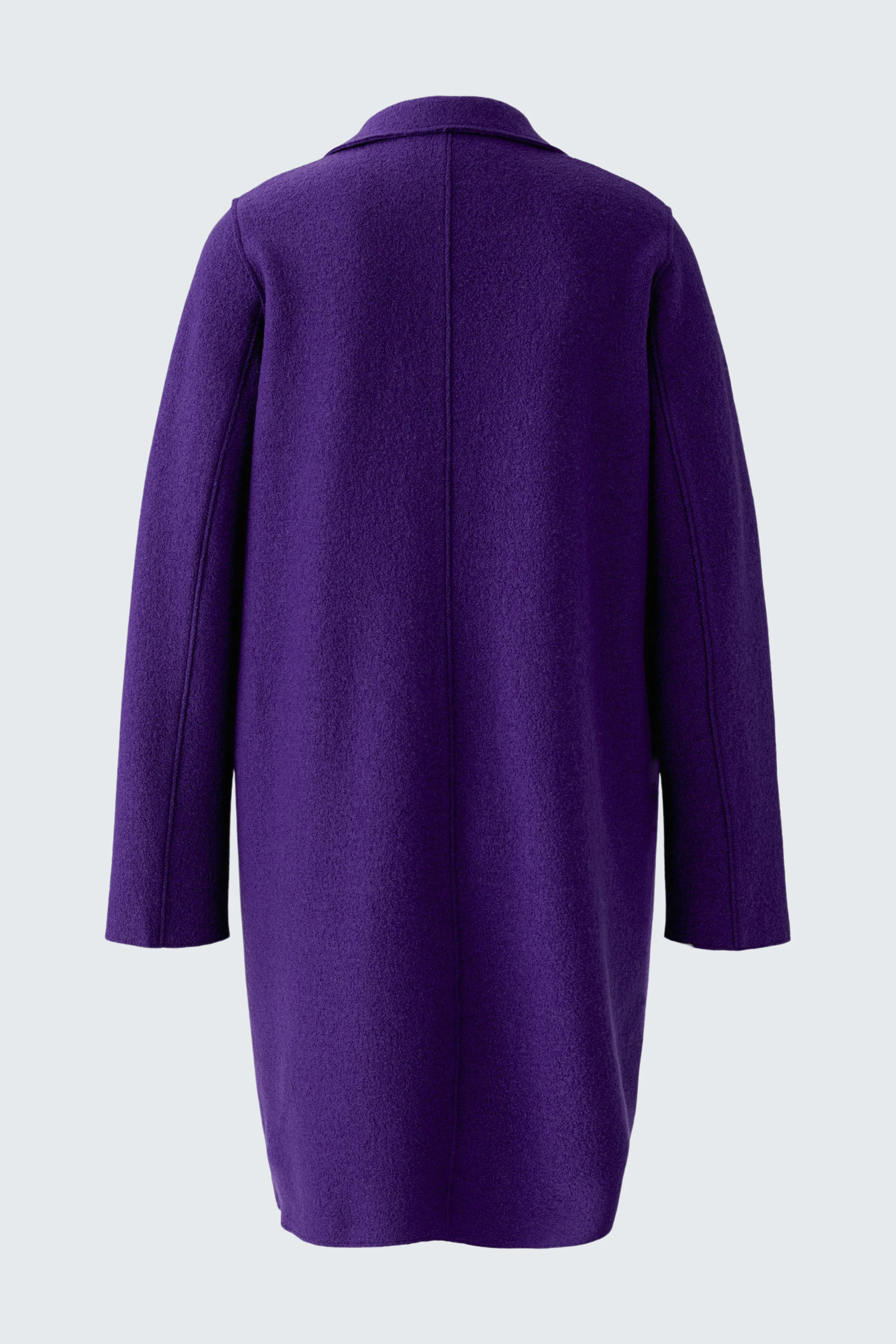 Purple wool coat: Simple, long design with clean lines, perfect for layering in cooler weather.