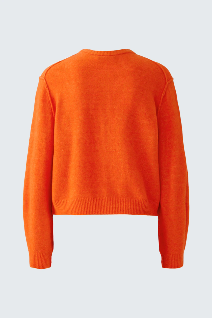 Strickjacke in leuchtendem Orange: Rückansicht ohne Model, schlichtes Design, ideal für lässige Outfits.