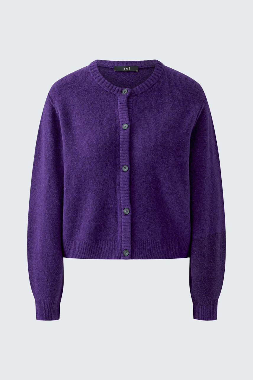 Purple knit cardigan: Cozy and casual, perfect for layering in cooler weather.