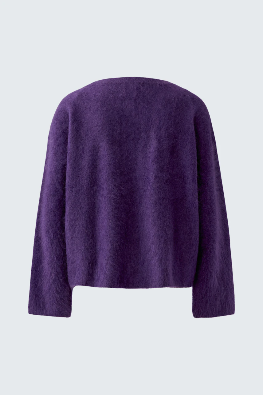 Purple pullover: Soft, textured fabric with long sleeves, perfect for casual wear.