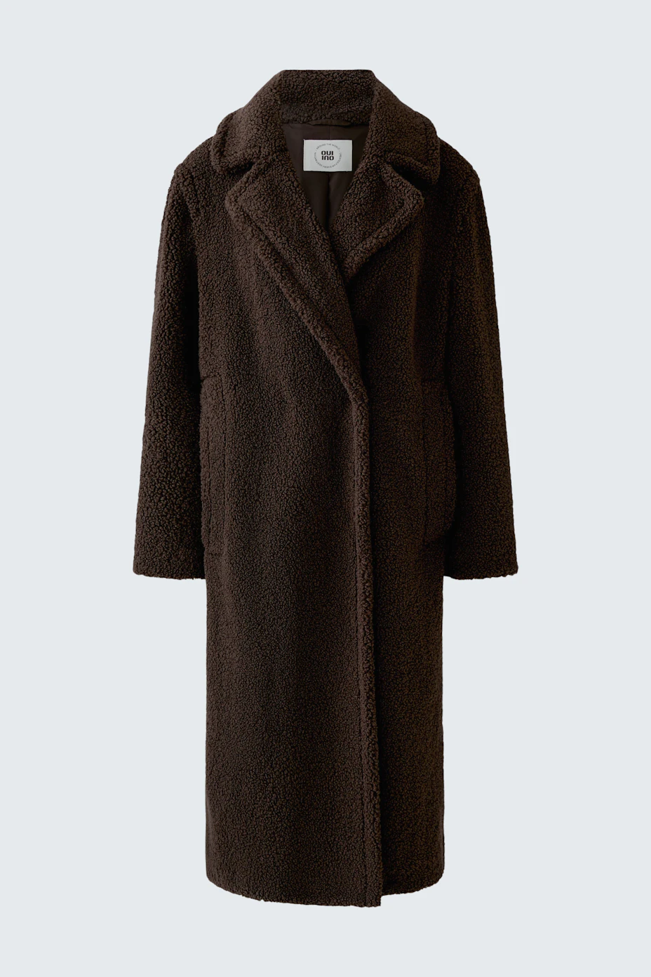 Kuscheliger Wintermantel in Dunkelbraun: Langer Mantel aus weichem Material, ideal für kalte Tage.