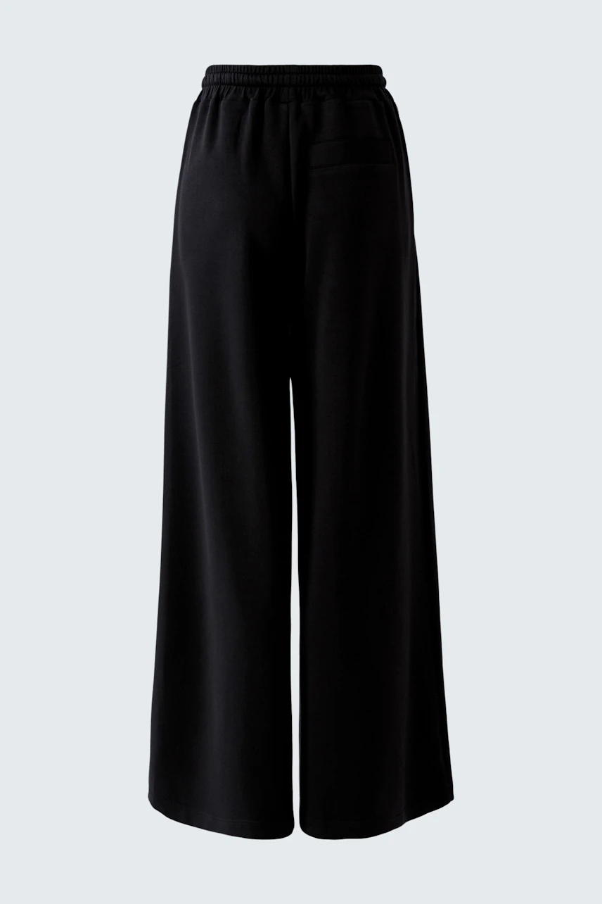 Black Marlene trousers: Wide-leg design with elastic waistband, perfect for a relaxed, stylish look.