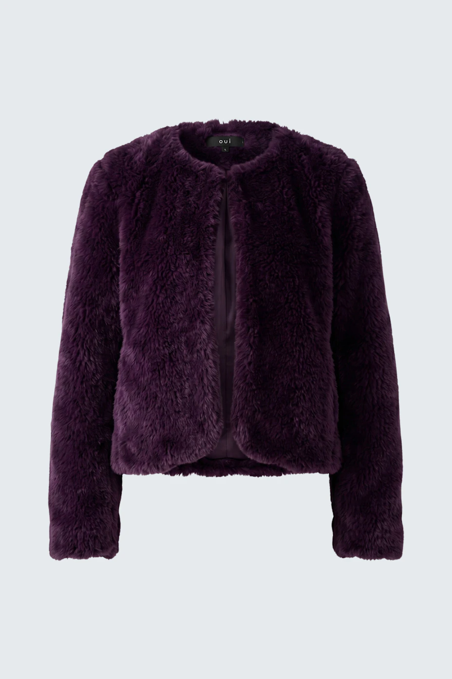 Plush purple cardigan: Soft, textured knitwear perfect for layering, adding warmth and style to any outfit.