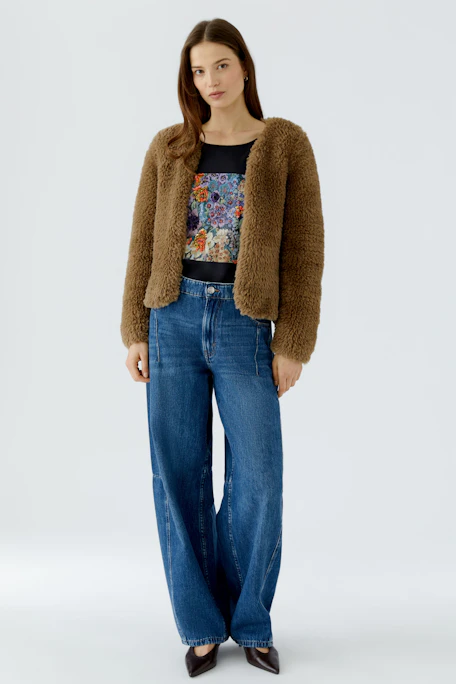 Cozy brown cardigan: Soft, textured knit perfect for layering in cooler weather.