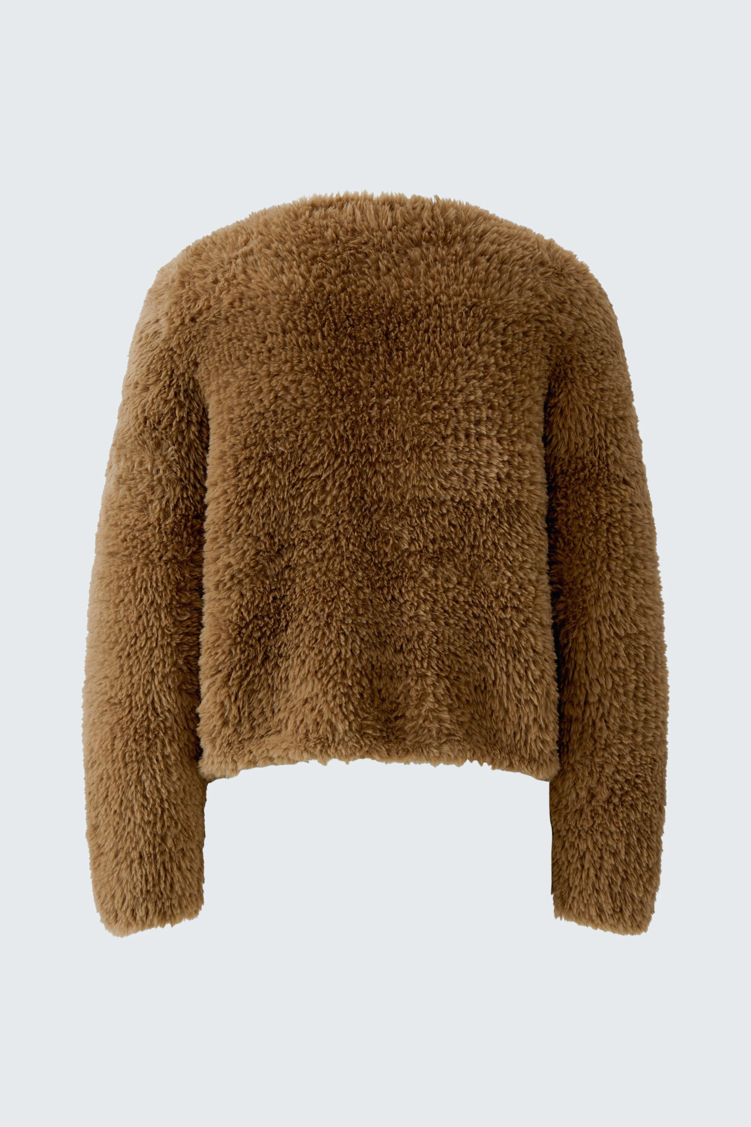 Cozy brown cardigan: Soft, textured knit perfect for layering, offering warmth and style.