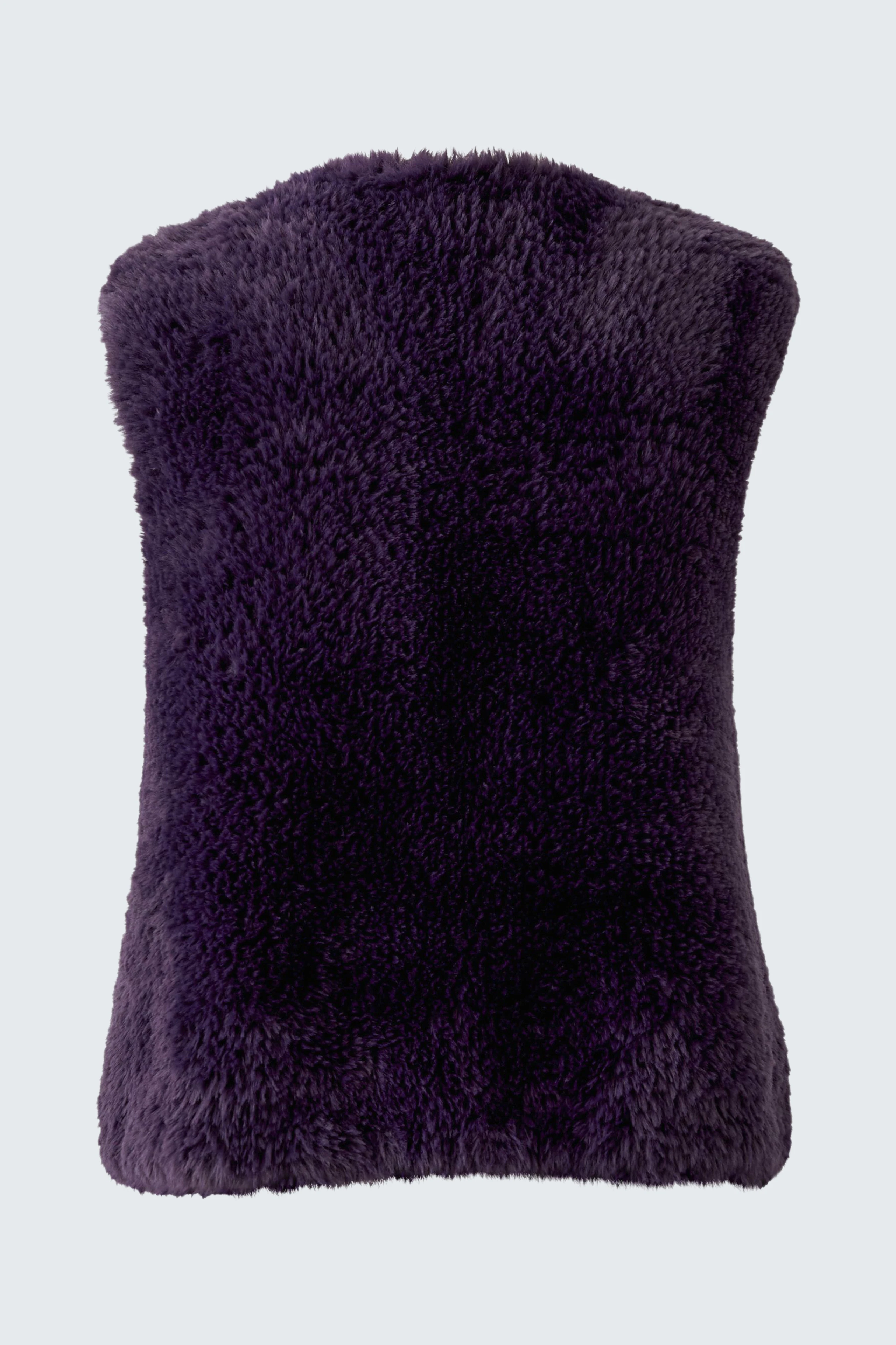 Cozy knit vest in deep purple, perfect for layering. Soft texture adds warmth and style to any outfit.