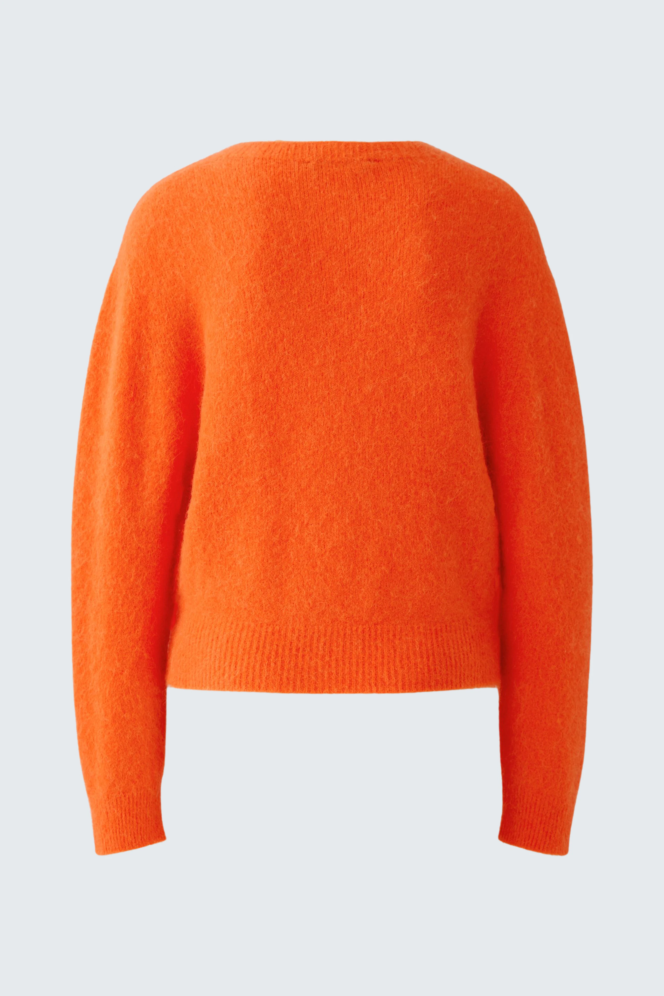 Leuchtend orangefarbener Damen-Pullover aus weichem Strick, ideal für einen auffälligen Look.