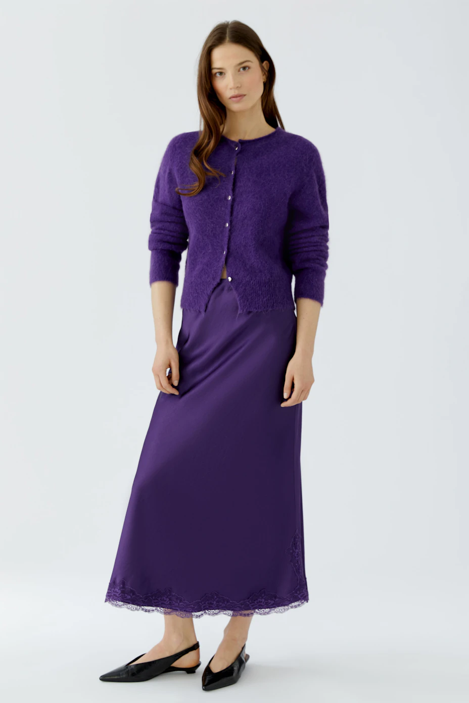 Purple knit cardigan: Cozy and stylish, perfect for layering in cooler weather.