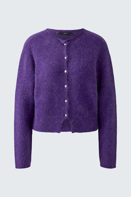 Purple knit cardigan: Cozy and stylish, perfect for layering in cooler weather.