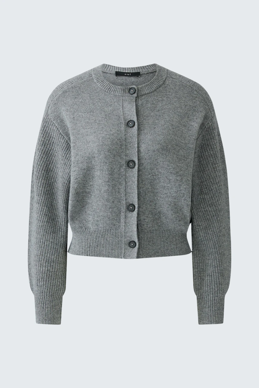 Casual women's cardigan: Grey knit cardigan with button-up front, perfect for layering.
