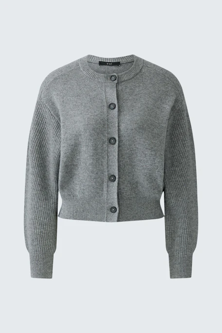 Casual women's cardigan: Grey knit cardigan with button-up front, perfect for layering.