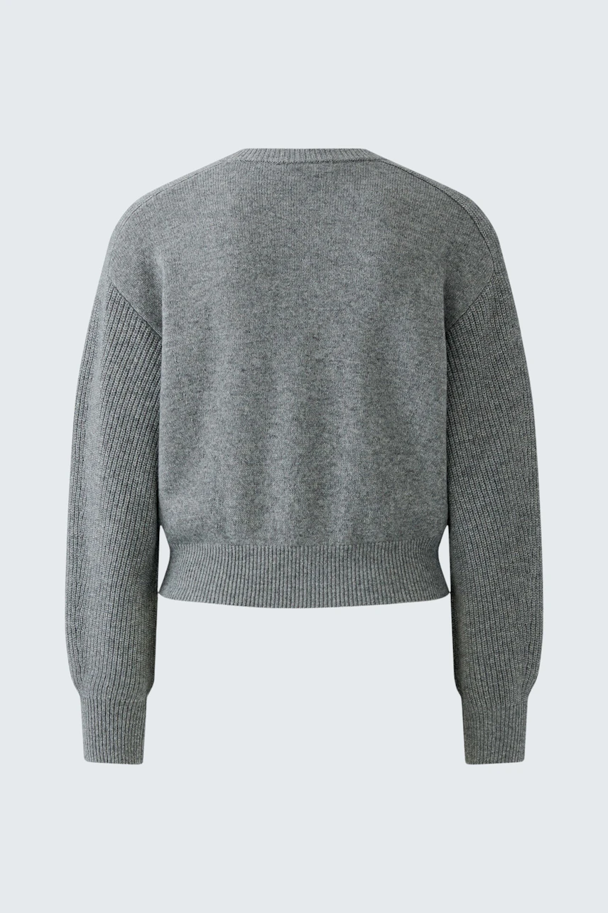Casual women's cardigan: Grey knit cardigan with ribbed cuffs and hem, shown from the back.