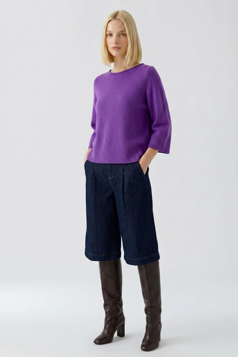 Vibrant purple pullover: Simple design with wide sleeves, perfect for a casual and comfortable look.