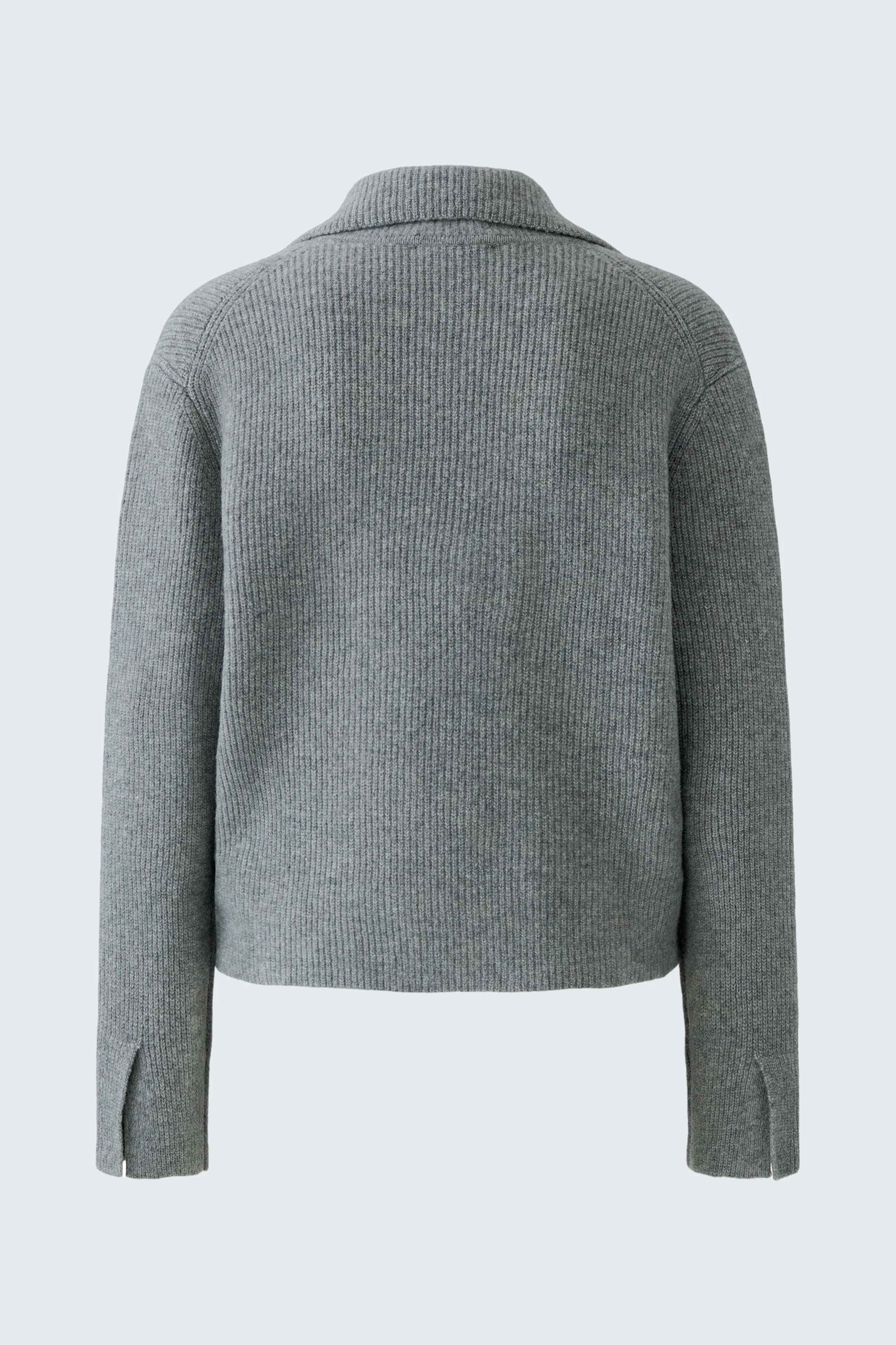 Casual women's cardigan in grey, shown from the back. Simple design with a cozy, relaxed fit.