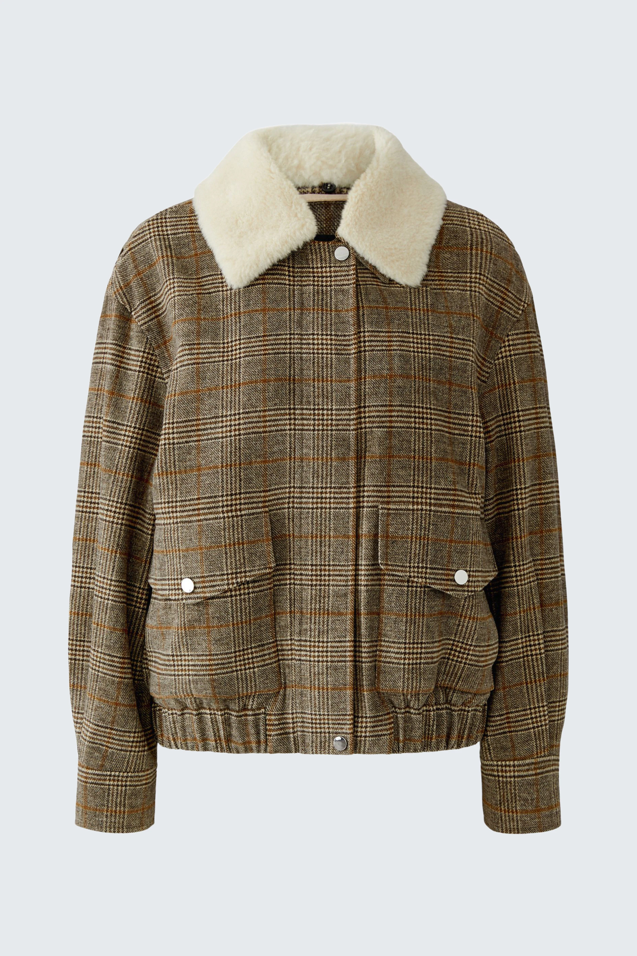Casual women's blouson: Brown checkered blouson with white faux fur collar, front pockets, and zip closure.