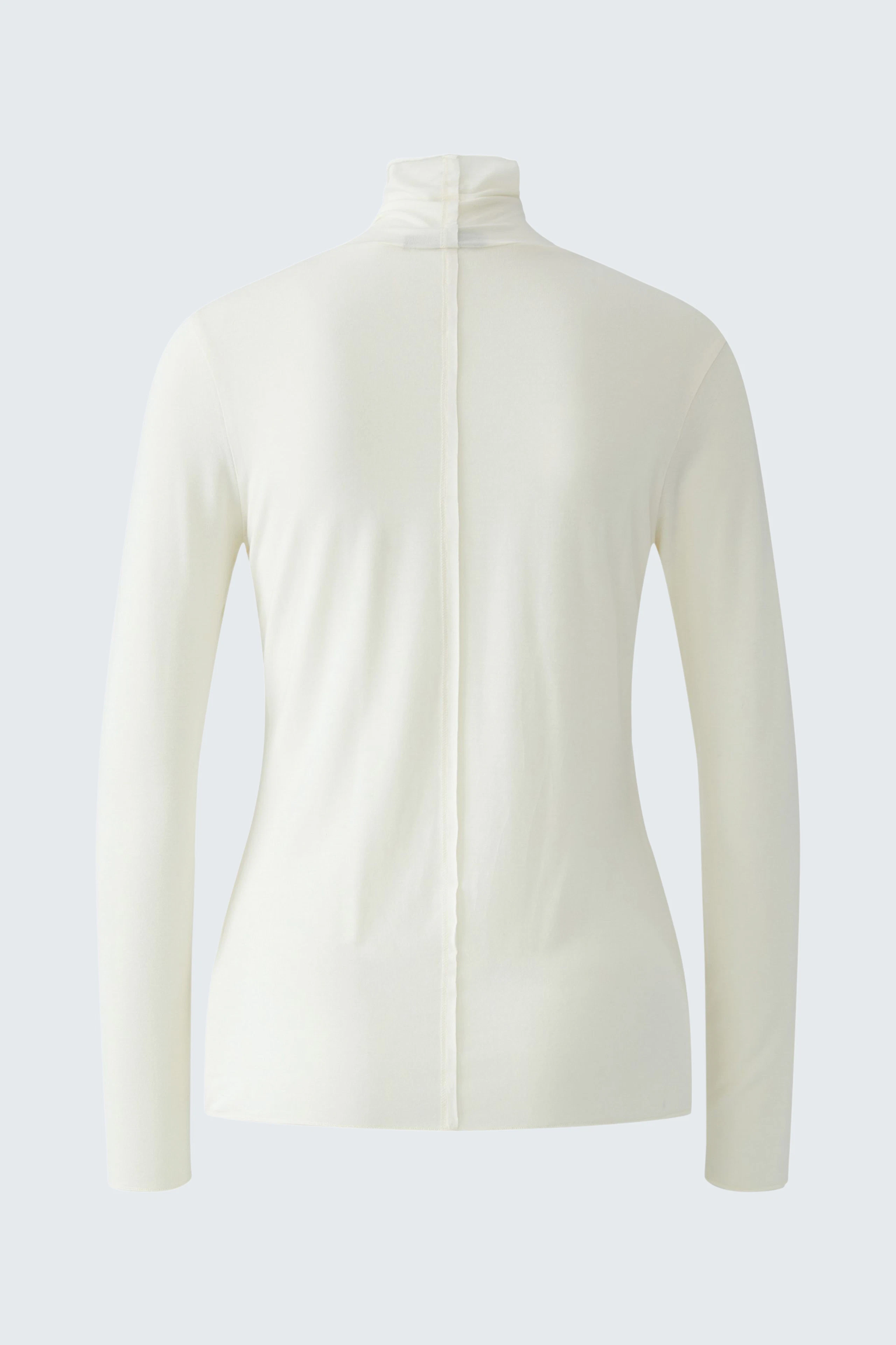 White long-sleeve shirt: Simple and versatile, perfect for layering or wearing alone.