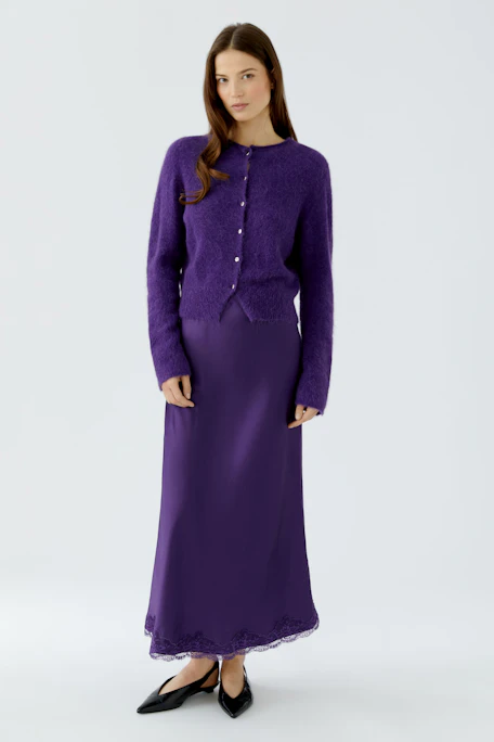 Purple maxi skirt with lace hem, perfect for a casual look. No model, just the skirt displayed.