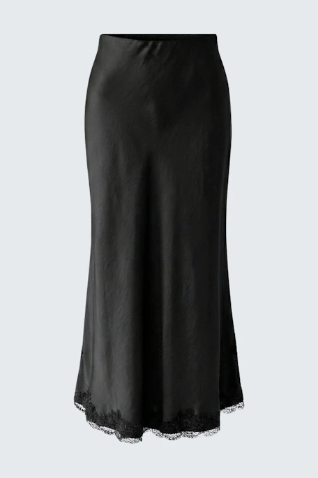 Black maxi skirt with lace hem, perfect for versatile styling. No model, just the skirt shown.