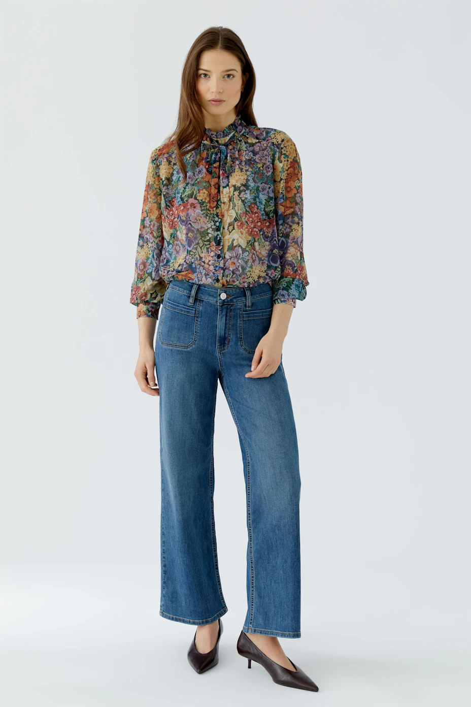 Bunte Damen-Bluse: Florales Muster, transparentes Design, ideal für einen frischen, modischen Look.