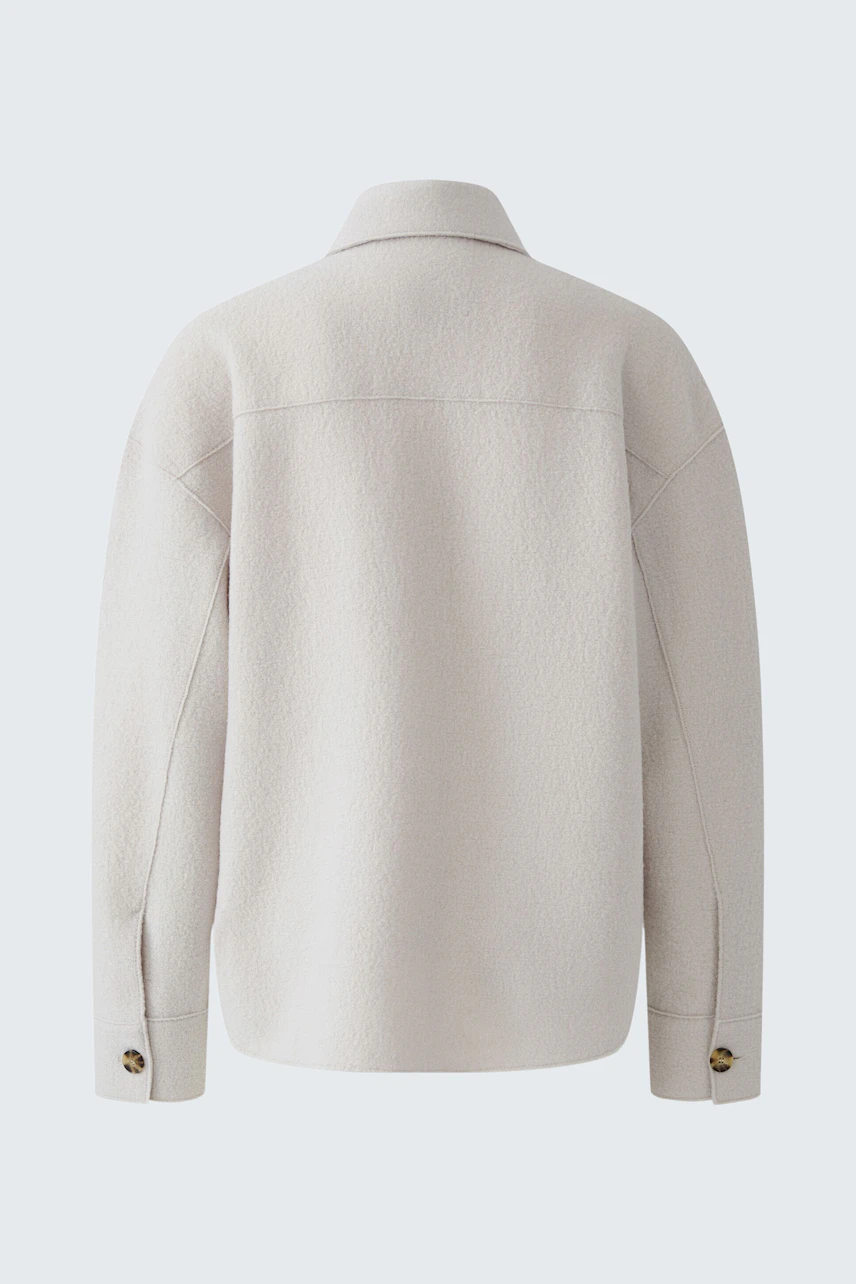 Casual women's overshirt in light fabric, shown from the back. Ideal for layering and everyday wear.