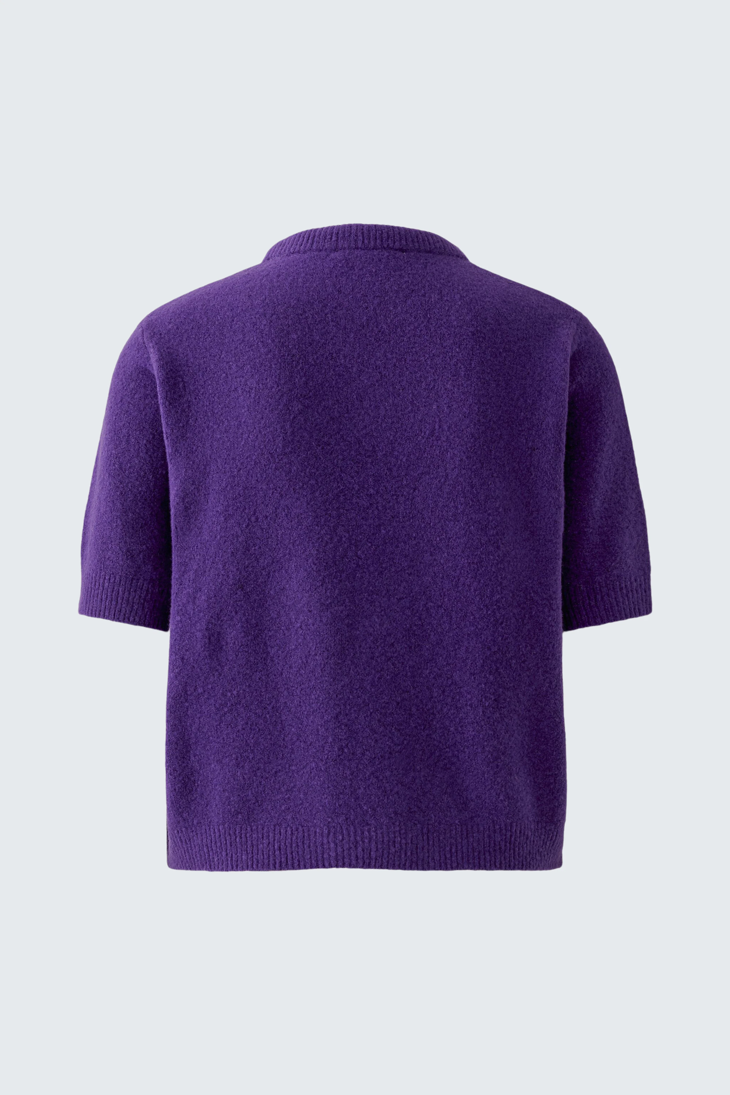 Purple pullover with short sleeves, shown from the back. Simple and cozy design for casual wear.