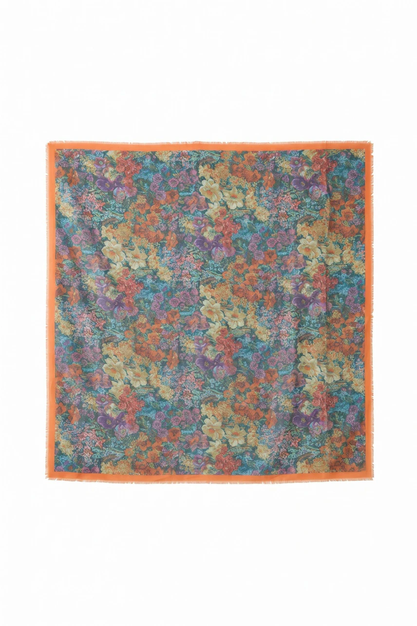 Colorful floral scarf with orange border, perfect for adding a vibrant touch to any outfit.