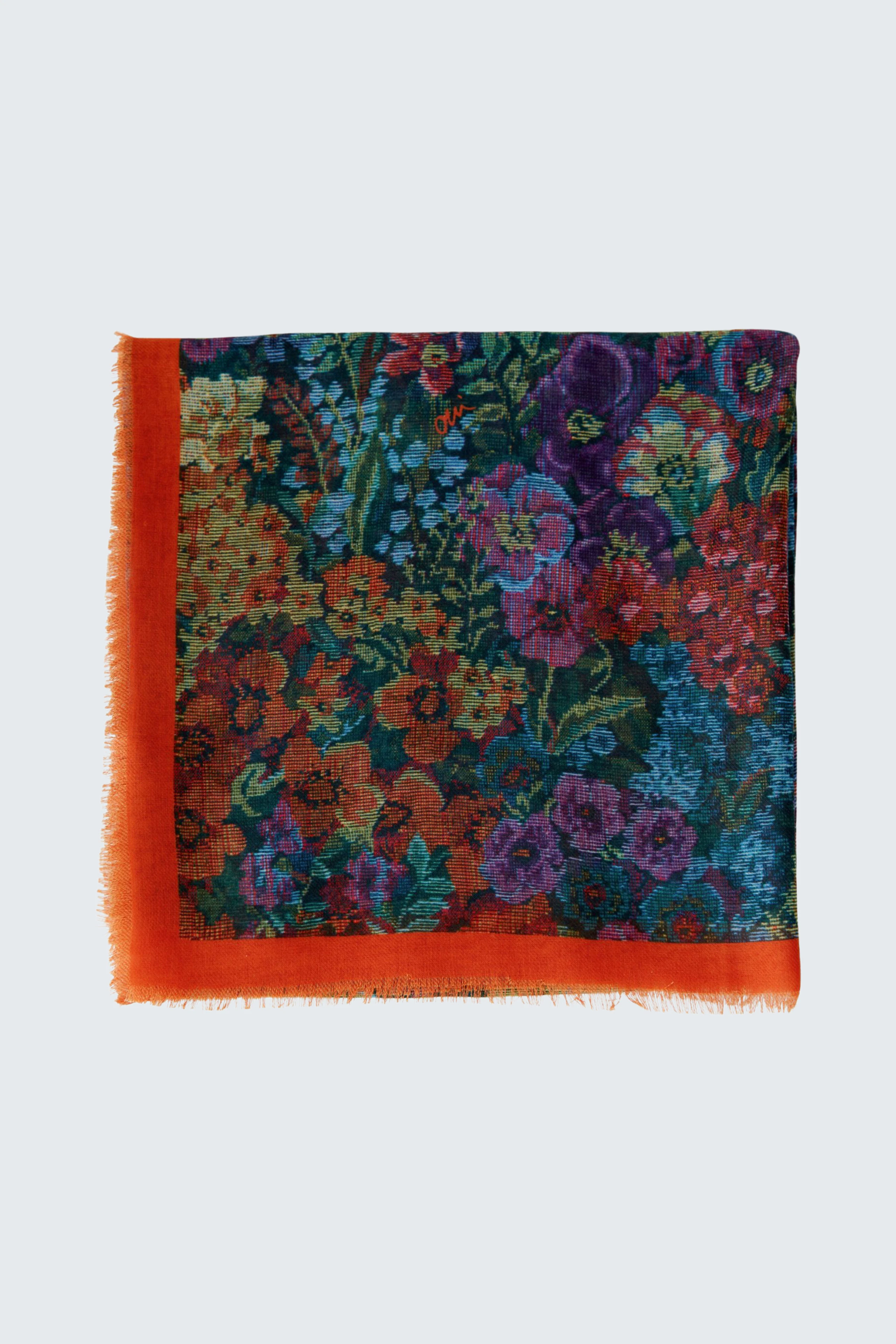 Colorful floral scarf with vibrant orange border, perfect for adding a pop of color to any outfit.