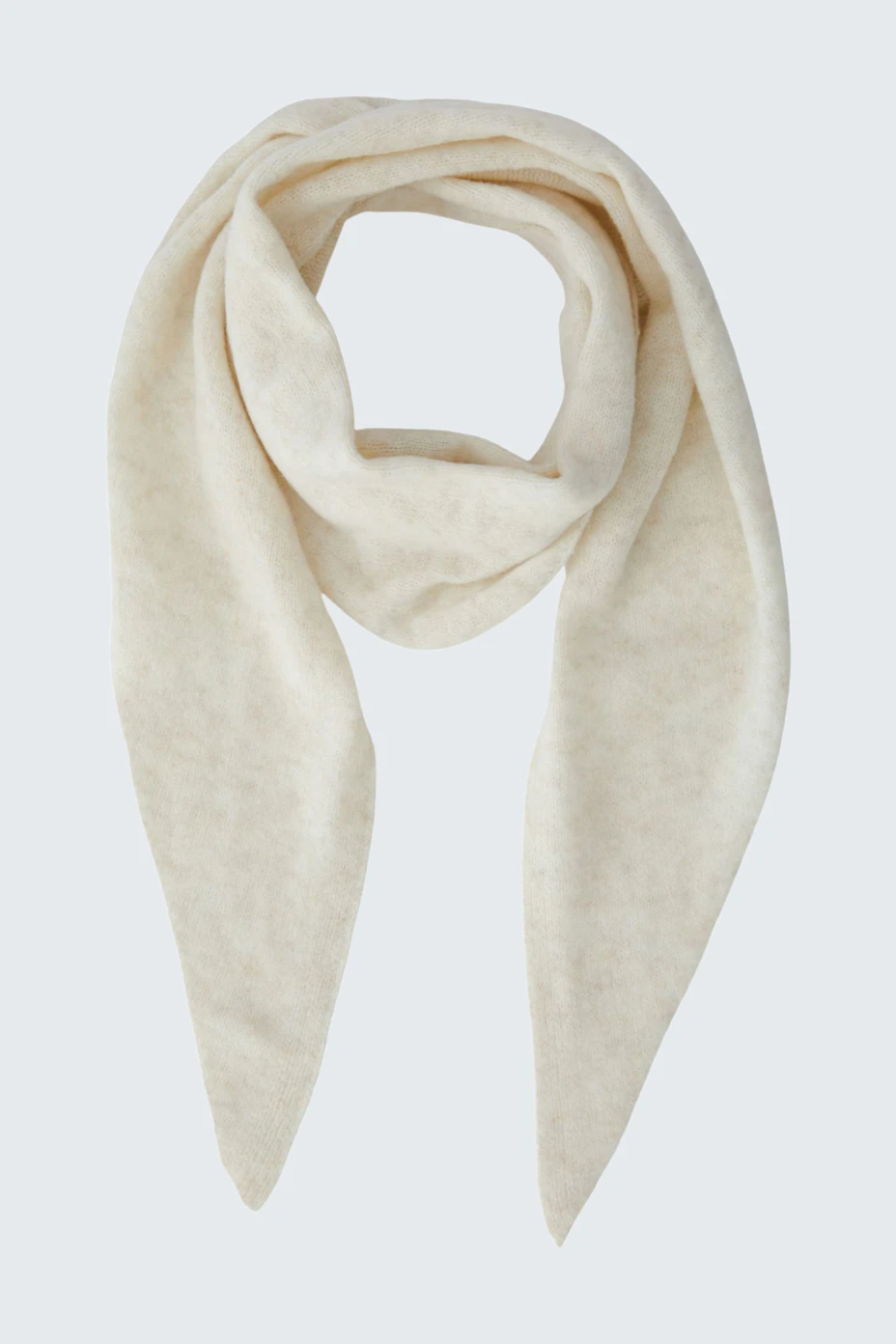 Soft beige scarf, perfect for layering. Cozy and versatile accessory for any casual outfit.