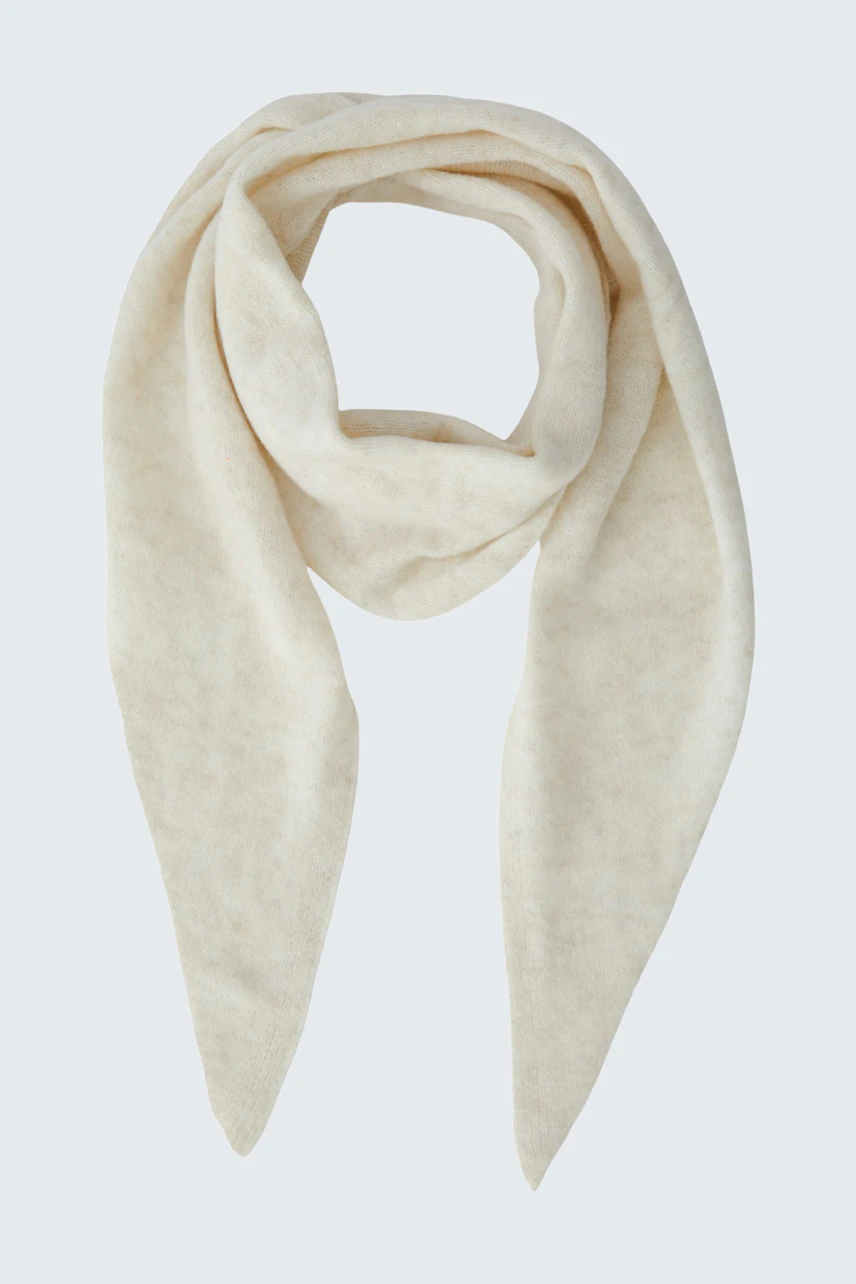 Soft beige scarf, perfect for layering. Cozy and versatile accessory for any casual outfit.