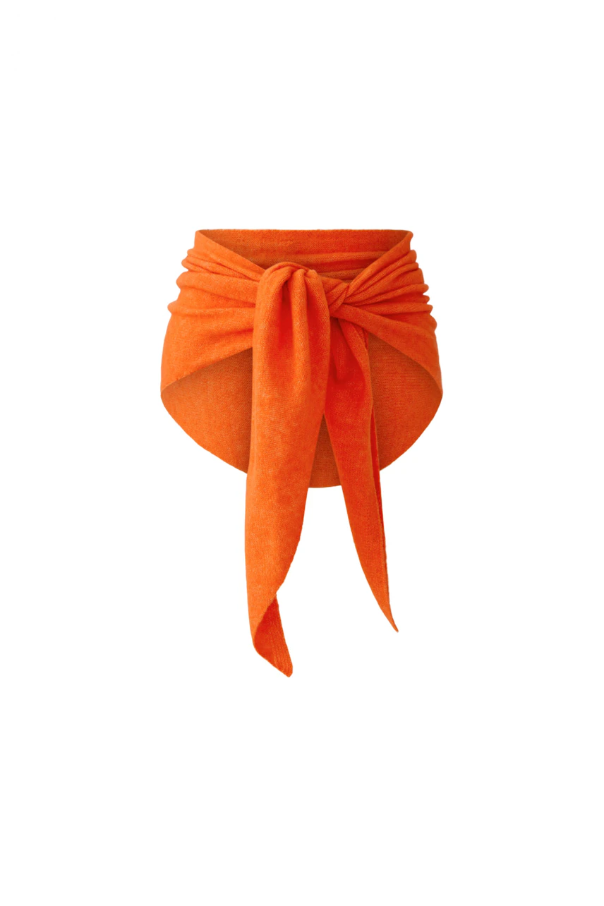 Bright orange scarf with a stylish knot design, perfect for adding a pop of color to any outfit.