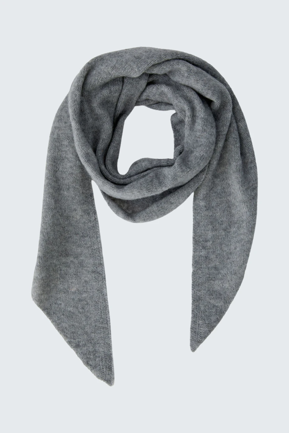 Soft grey scarf: Cozy and versatile accessory for any outfit.