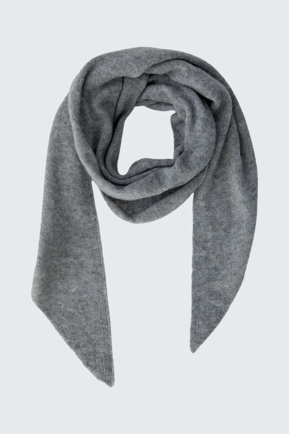 Soft grey scarf: Cozy and versatile accessory for any outfit.