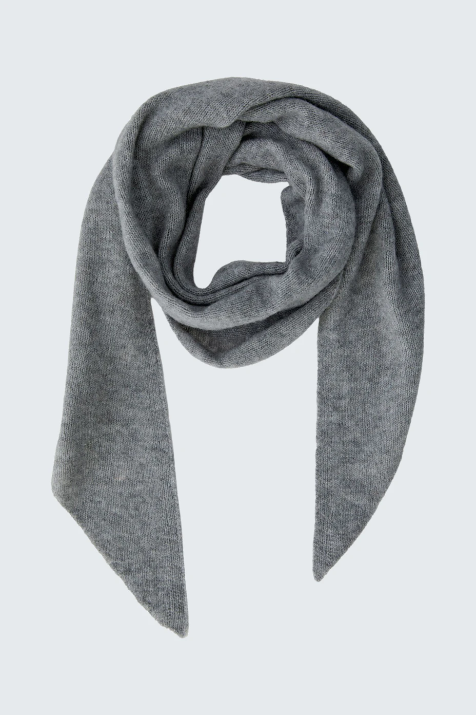 Soft grey scarf: Cozy and versatile accessory for any outfit.