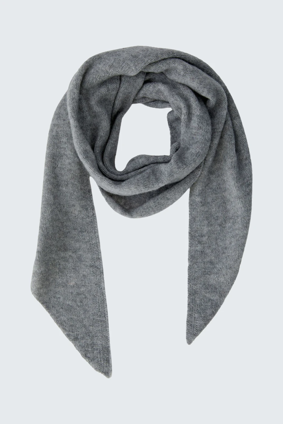 Soft grey scarf: Cozy and versatile accessory for any outfit.
