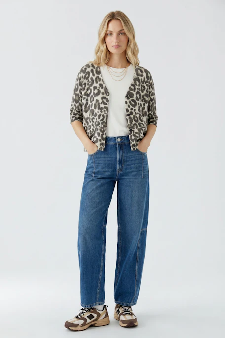 Leopard print cardigan: Soft knit with button closure, perfect for layering. No model, just the garment.